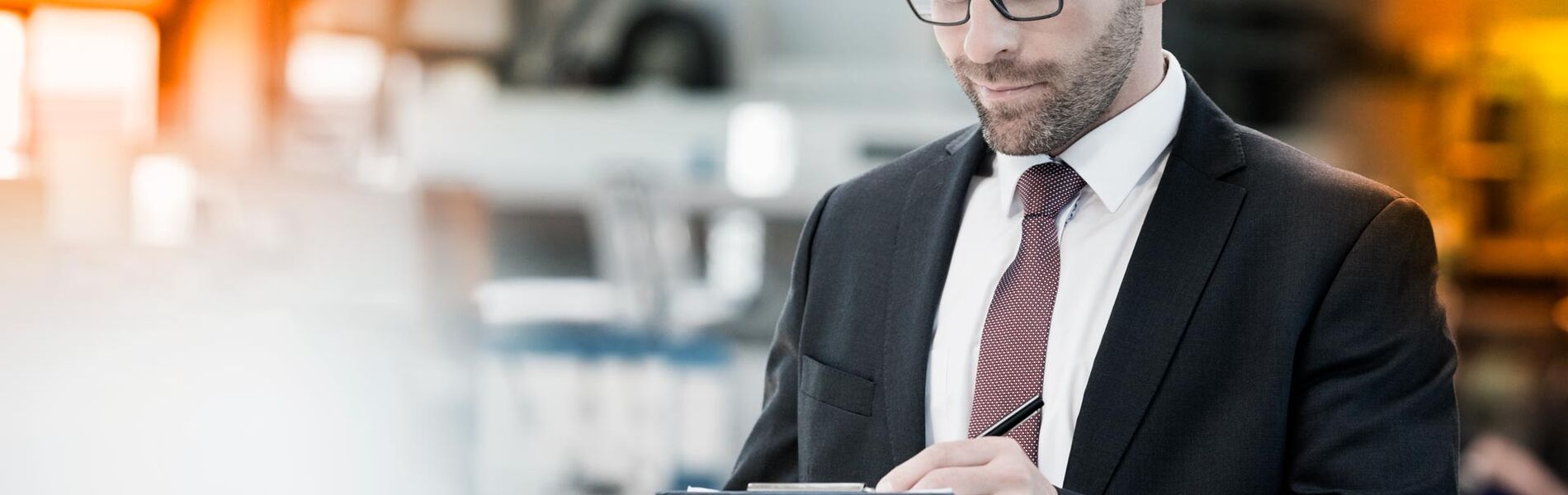 Offshore oil and gas industry with piping and valves, worker in foreground